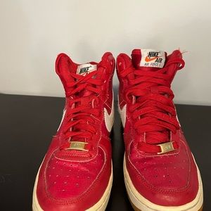 Red Nike Air Force 1 high tops